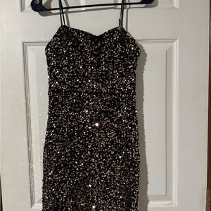 Elegant Strapless Sequin Dress in Black and Gold